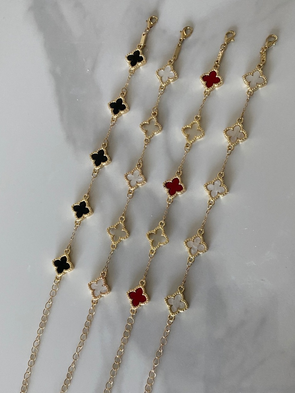 Gold Bracelet Clover Motifs Red Black White NEW
